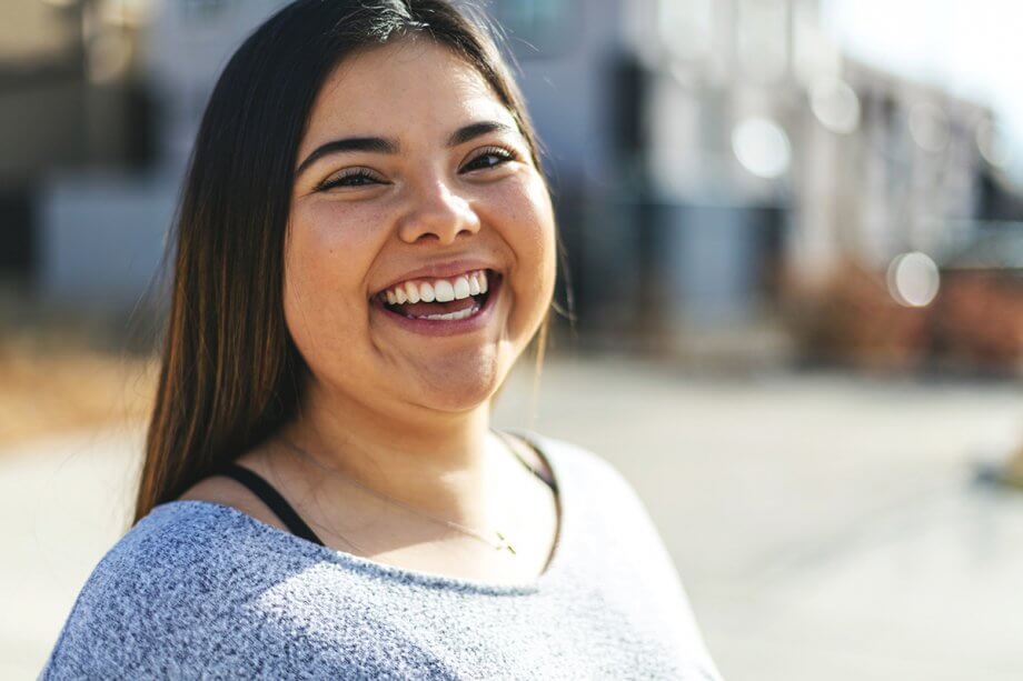 teen girl smiling at camera